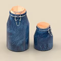 Two Blue Swirl Pattern Spice Jars With Copper Lids And Metal Clasps 3d model