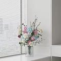 Elegant Vase with Mixed Pink Blue White Flowers by Window Blinds and White Wall