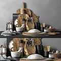 Natural Kitchenware Display On Counter With Wooden Chopping Boards Mortar Pestle And Wicker Baskets