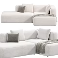 Stylish Gray and White Sectional Sofa with Soft Pillows and Cozy Throw Blanket