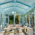 Modern Villa Balcony With Glass Structure And Surrounding Green Plants