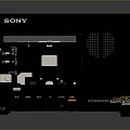 Vintage Black Portable Computer Device Featuring Open Screen Control Buttons And Speaker Grille