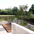 Beautiful Courtyard Garden With Wooden Deck Lush Green Plants Colorful Flowers And Black Fence