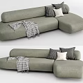 Gray Upholstered Sectional Sofa With Plush Throw Pillows And Checkered Blanket 3d model