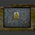 Industrial Electrical Box Enclosed In Brick Structure With Warning Sign And Graffiti