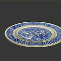 Intricate Sculptural Carving On Ceramic Plate With Blue White Pattern And Ornate Design