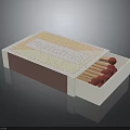 Open Matchbox With Red Wooden Matches And White Brown Labeled Exterior