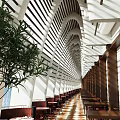 Modern Restaurant Interior With Arched Wooden Slats Green Plants And Dining Tables