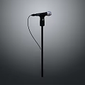 Black Wired Headphones With Microphone Stand And Sleek Design For Audio Use