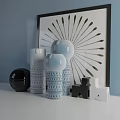 Ornamental Decorative Set Featuring Sunburst Wall Art Black Sphere Blue White Vases And Geometric Figurines