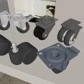 Different Types Of Heavy Duty Rubber Tires With Metal Brackets Displayed On White Surface