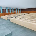 Conference Room Interior With Rows of Seats Wooden Walls Blue Stripes and Gray Floor Tiles