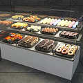 Assorted Dessert Display With Donuts Macarons Cakes And Pastries In Glass Showcase