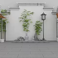 Traditional Chinese Garden Ornaments With Bamboo Plants Stone Lantern Rockery Stones And White Wall