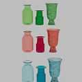 Colorful Ceramic Vessels With Varied Shapes And Vibrant Blue Red Orange Tones