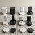 Smart Machines Featuring Various White And Black Smart Devices Arranged On Textured Surface 3d model