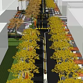 Scenic Commercial Street With Yellow Leaf Trees Buildings And Road Traffic