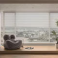 Interior Living Space With White Blinds Large Window Striped Chair Potted Plant Wooden Floor