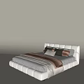 White Upholstered Double Bed with Curved Headboard White Sheet Brown Throw and Gray Pillows