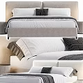 Modern Double Bed With Upholstered Headboard White Linens And Striped Pillows