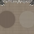 Two Woven Round Rugs With Fringed Edges On Light Wooden Floor