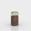 Transparent Glass Spice Jar With Golden Lid And Spice Granules On White Surface