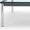 Modern Coffee Table With Clear Glass Top And Sleek Metal Frame Design