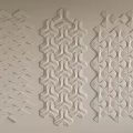 Modern White Wall Decor with Three Geometric Patterns Arranged on Wall Surface 3d model