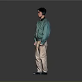 Man in Green Jacket and Beige Pants Standing with Headphones on Gray Background