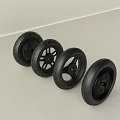 Set of Four Different Black Bicycle Tires Displayed on Light Background