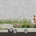 Beautiful Green Grass White Blooms Pink Flowers in White Planters with Glowing Lights Rabbit Decor