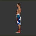 Shirtless Male Boxer Standing in Red White Shorts Red Shoes and Blue Yellow Gloves