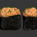 Fresh Crab Sushi Pieces With Orange Filling And Green Scallions On Black Background
