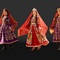 Three Ethnic Women In Traditional Colorful Costumes With Ornate Embroidery And Headscarves