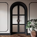 Black Arched Double Doors With Pleated Glass And Round Handle In Interior With Green Plant