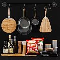 Practical Kitchen Cooking Utensils With Hanging Frying Pans Wooden Cutting Boards And Spice Bottles