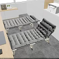 Gray Folding Beds In Office With Wooden Desk And White Cabinets