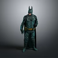 Batman Character Wearing Green Armored Suit With Cape And Helmet Standing