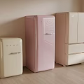 Vintage Refrigerators in Cream Pink and Light Pink Against Light Wall with Wooden Floor
