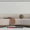 Modern Beige Upholstered Sectional Sofa With Wooden Base Throw Blanket And Decorative Ball