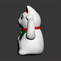 White Lucky Cat Figurine With Red Ears Green Collar Yellow Accent And Raised Paw