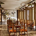 Traditional Chinese Restaurant Interior With Wooden Screens And Dining Tables
