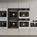 Modern Built In Kitchen Appliances Including Ovens Coffee Machine And Cabinets