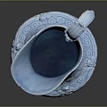 Blue Ceramic Wine Bottle And Glass With Ornate Patterns Displayed On Dark Background