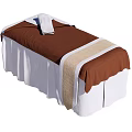Comfortable Massage Bed With Brown Towel White Towel And White Base