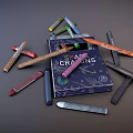 Colorful Crayons Scattered Around Open Box With CRAYONS Text On Cover