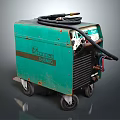 Green Welding Machine with Wheels and Black Cables BILIG Industrial Equipment for Welding Work