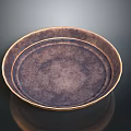 Round Textured Ceramic Plate With Dark Brown Surface And Golden Rim For Household Use