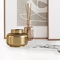 Modern Decorative Ornament Combination With Framed Artworks Aromatic Bottles And Stacked Books
