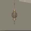 Ornate Golden Chandelier With Intricate Filigree Design Casting Beautiful Shadow Patterns On Wall